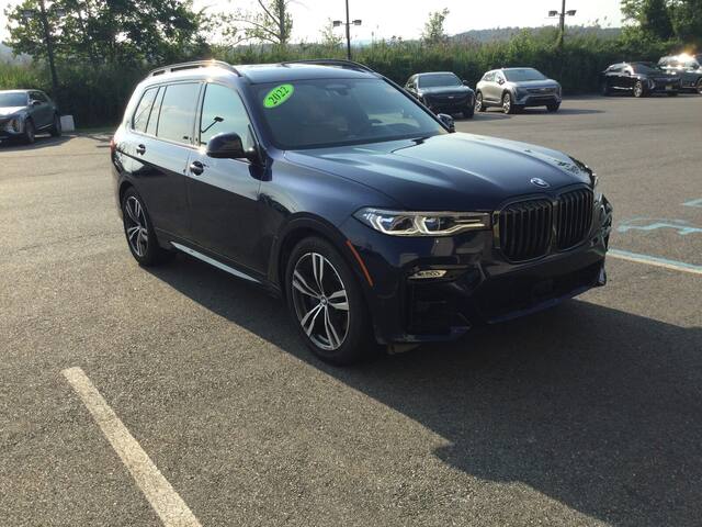 BMW SUV being inspected before purchase
