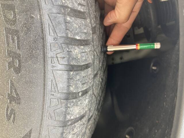 Tire tread depth measurement with gauge