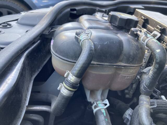 Engine bay inspection under the hood